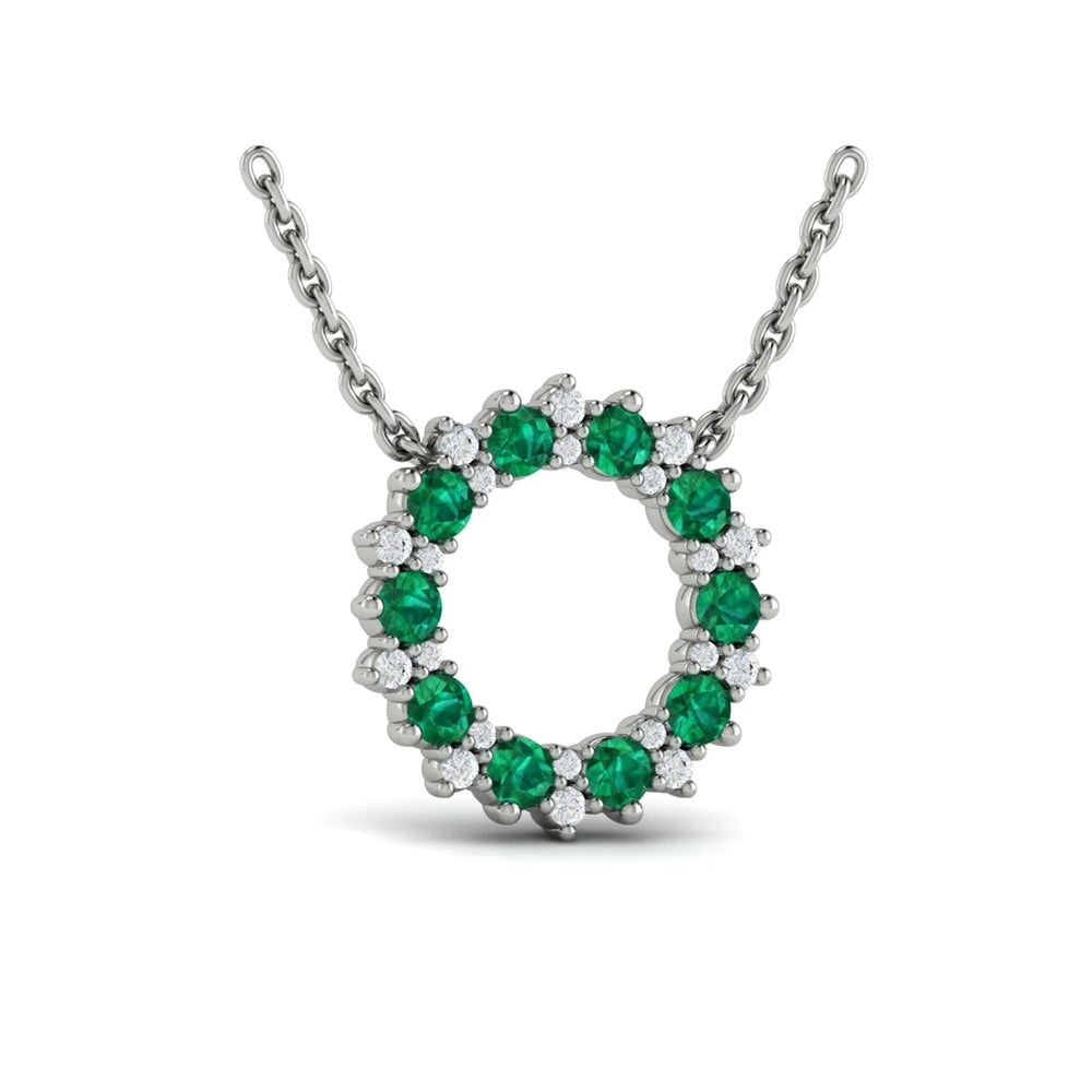 Diamond and Emerald Open Starburst Circle Pendant Necklace White Gold