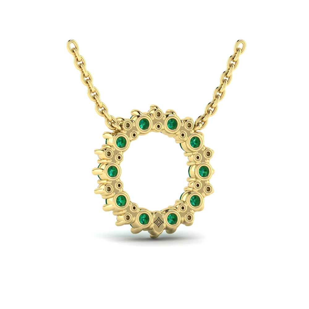 Diamond and Emerald Open Starburst Circle Pendant Necklace Yellow Gold