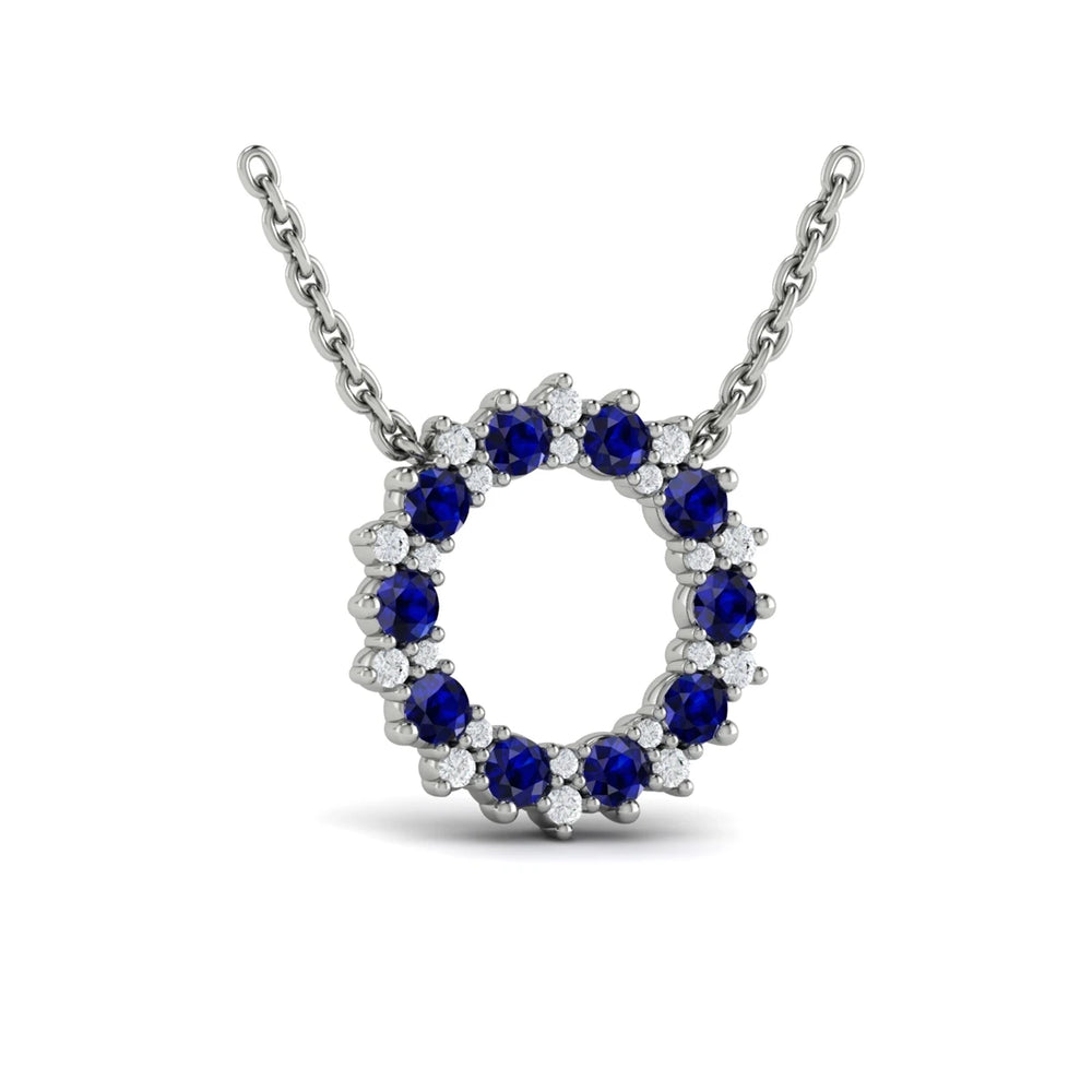 Diamond and Blue Sapphire Open Starburst Circle Pendant Necklace White Gold