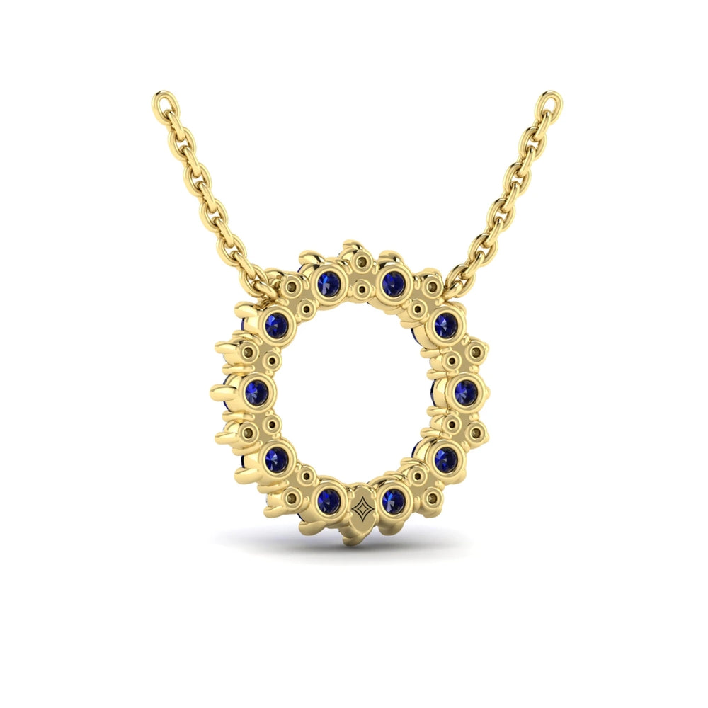 Diamond and Blue Sapphire Open Starburst Circle Pendant Necklace Yellow Gold