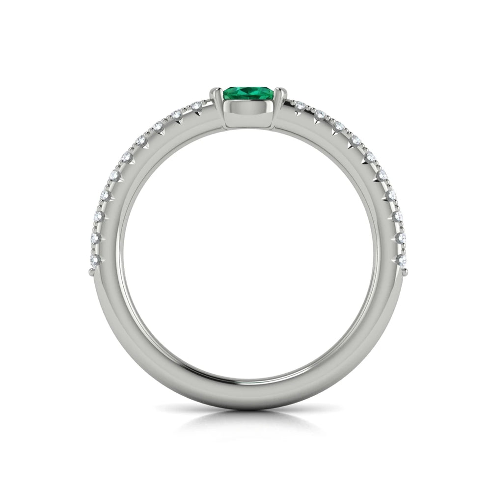 Diamond and Oval Emerald Centerstone Ring White Gold