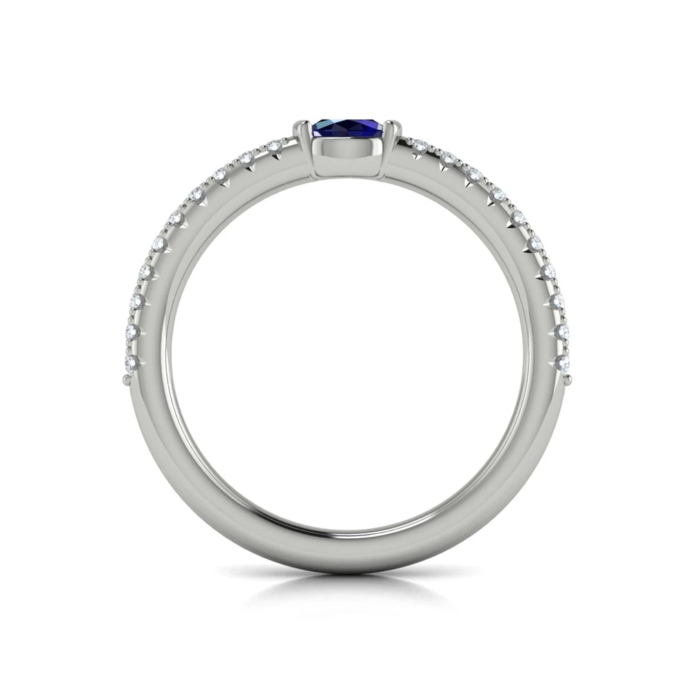 Diamond and Oval Sapphire Centerstone Ring White Gold