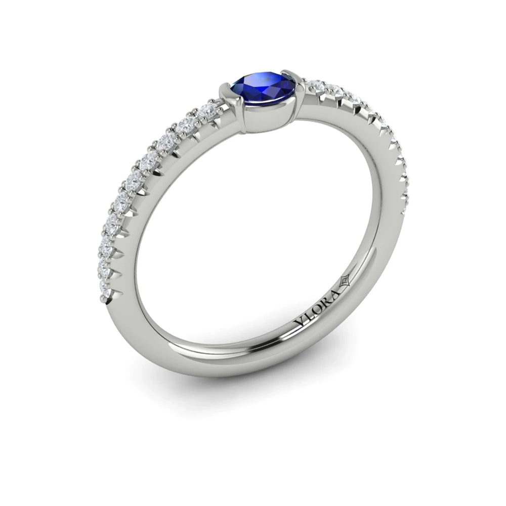 Diamond and Oval Sapphire Centerstone Ring Platinum
